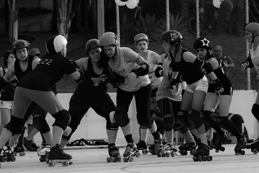 P-Town Roller Derby intraleague photo, both jammers exiting the pack.