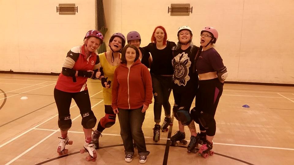 Wee County's first crop of newbie skaters (Rammy 3rd from right), with Voodoo's Roll-n-Pin 2nd-from-right visiting the open session .