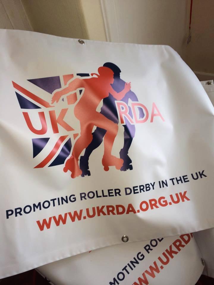The UKRDA logo, on a folded banner.