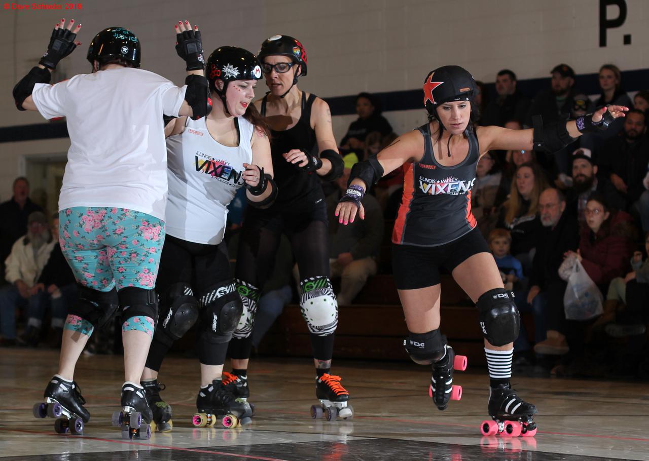 Illinois Valley Vixens Roller Derby during their first public bout under Short Track Rules.(Photo used by permission of Dave Schrader under license. [not covered by site CC license] )